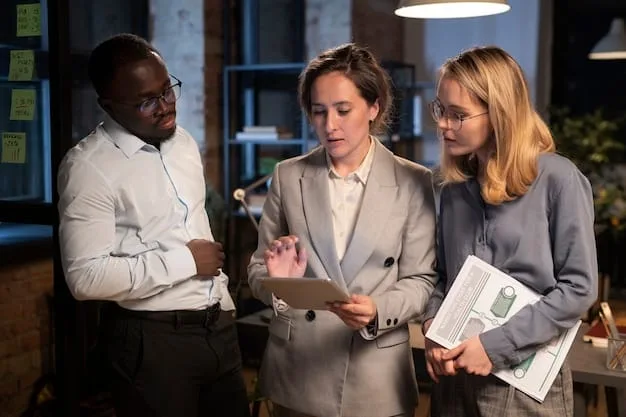 A diverse group of business professionals in a meeting, reviewing documents and discussing compliance strategies, symbolizing collaboration and diligent oversight.
