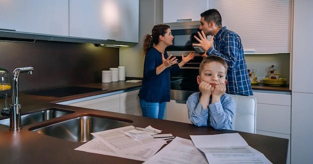 A family looking worried while sitting at their kitchen table, surrounded by bills. The scene conveys financial stress.