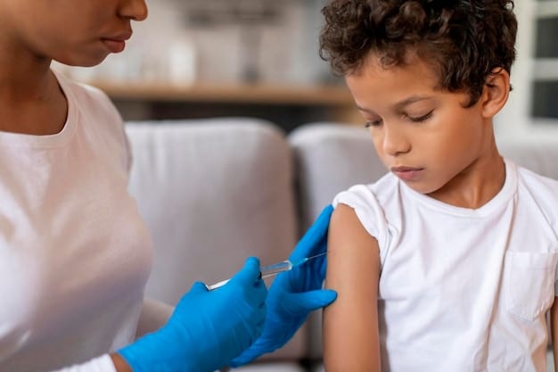 A close-up shot of a healthcare professional administering a vaccine to a child in a doctor's office. The child is smiling, and the healthcare professional is wearing gloves and a mask. The background includes medical equipment and posters promoting vaccination.